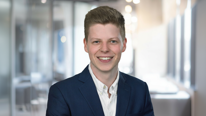 Professional portrait of Max Jaekel, CeramTec representative, smiling in a business setting at DKOU 2026 Berlin.